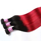 Noir à l'agrafe rouge d'Ombre dans des prolongements de cheveux pour de longs cheveux sans l'embrouillement