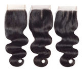 Cheveux 100% onduleux brésiliens de Vierge les longs empaquettent trois parties x la fermeture 4